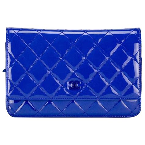 chanel blue patent woc|Chanel handbags on chain.